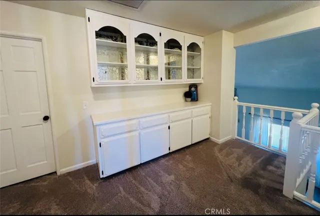 a view of a kitchen with windows