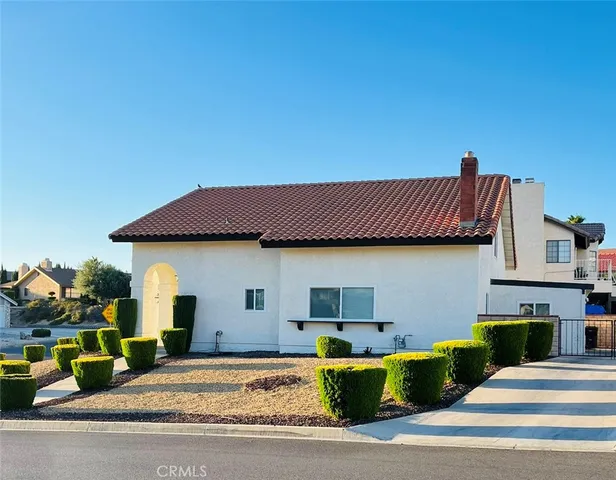 a view of a house with a patio