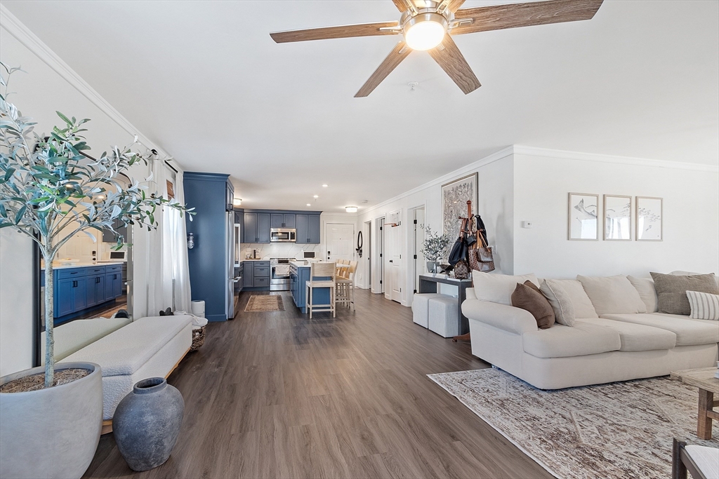 20 Cable Avenue, Unit 5 Salisbury, MA 01952 - Photo 17 of 23 a living room with furniture and wooden floor