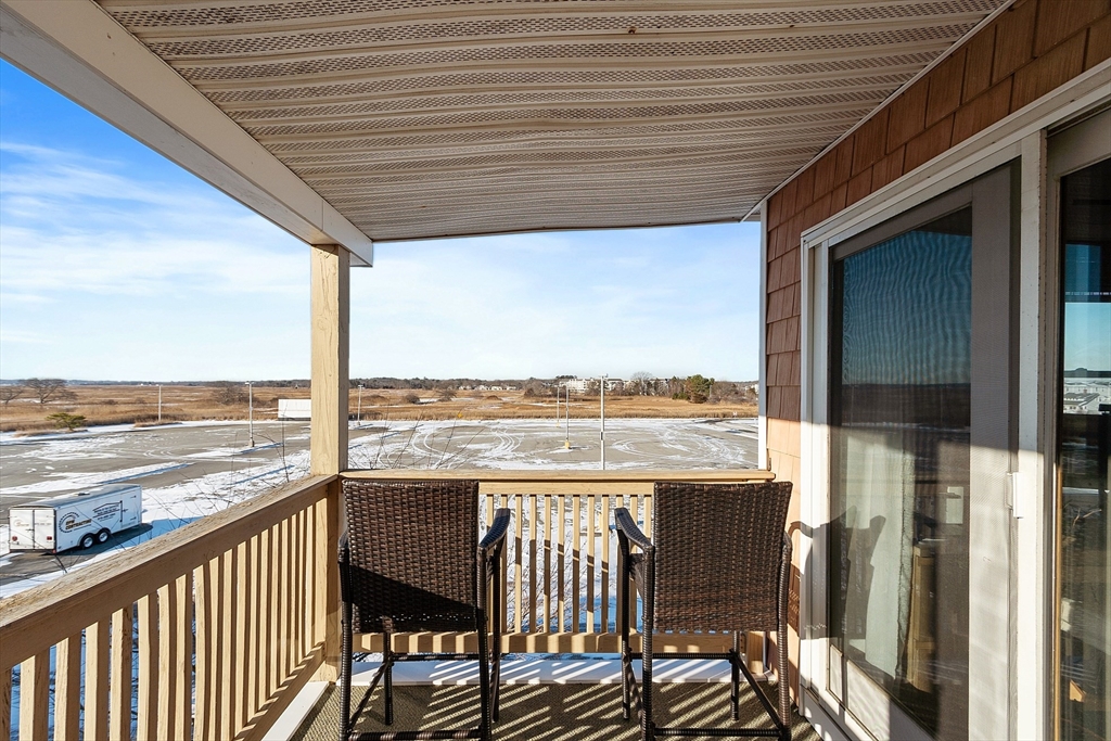 20 Cable Avenue, Unit 5 Salisbury, MA 01952 - Photo 20 of 23 a view of a balcony with ocean view