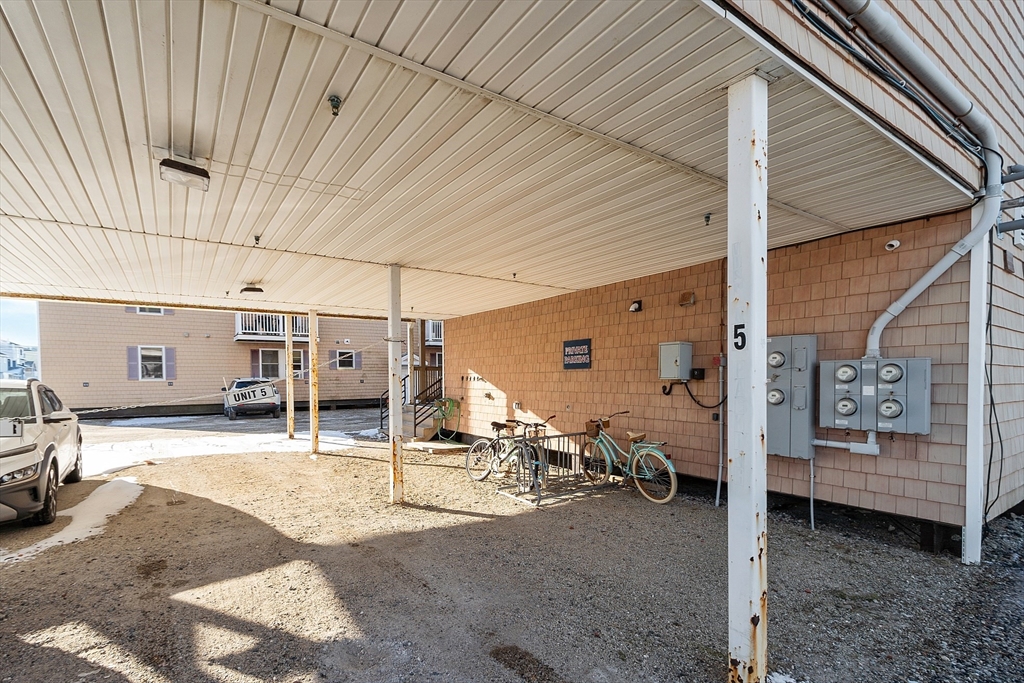 20 Cable Avenue, Unit 5 Salisbury, MA 01952 - Photo 21 of 23 a view of a patio with table and chairs