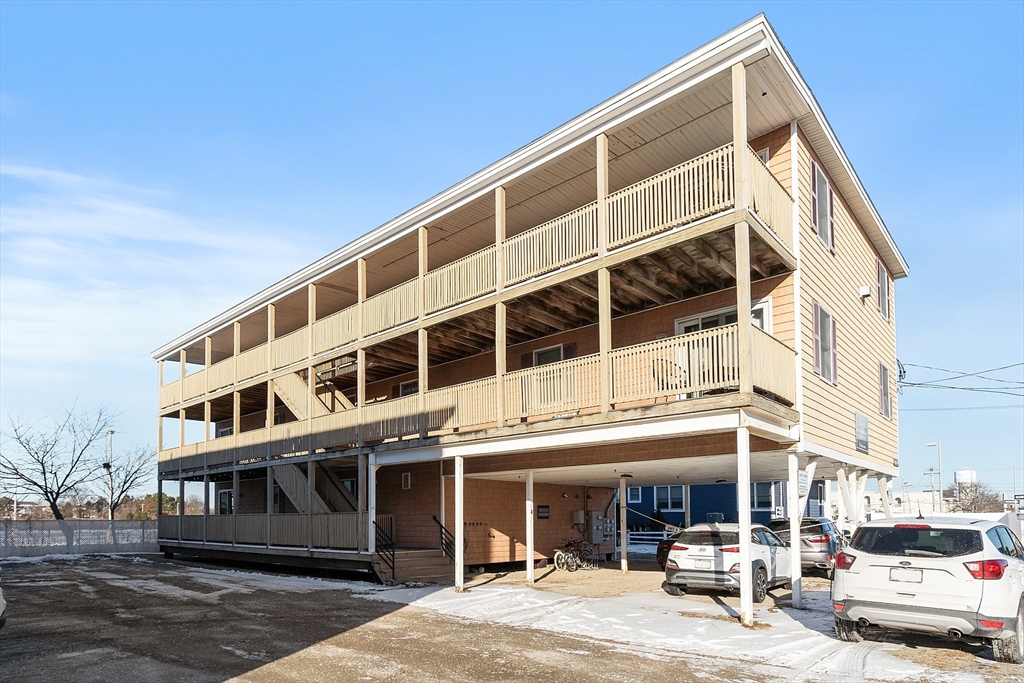 20 Cable Avenue, Unit 5 Salisbury, MA 01952 - Photo 22 of 23 a front view of a building with street view