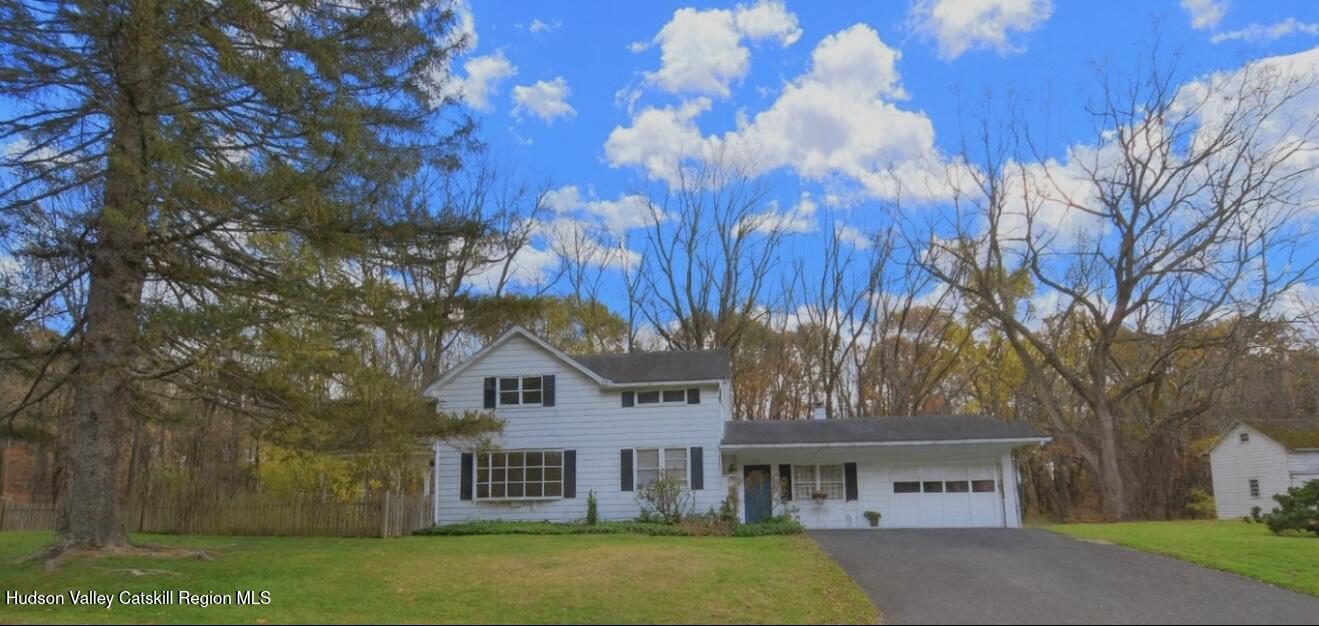 front view of house with a yard
