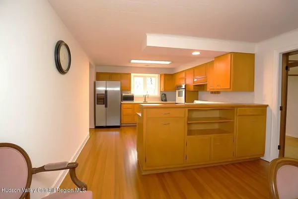 a view of a kitchen with a sink