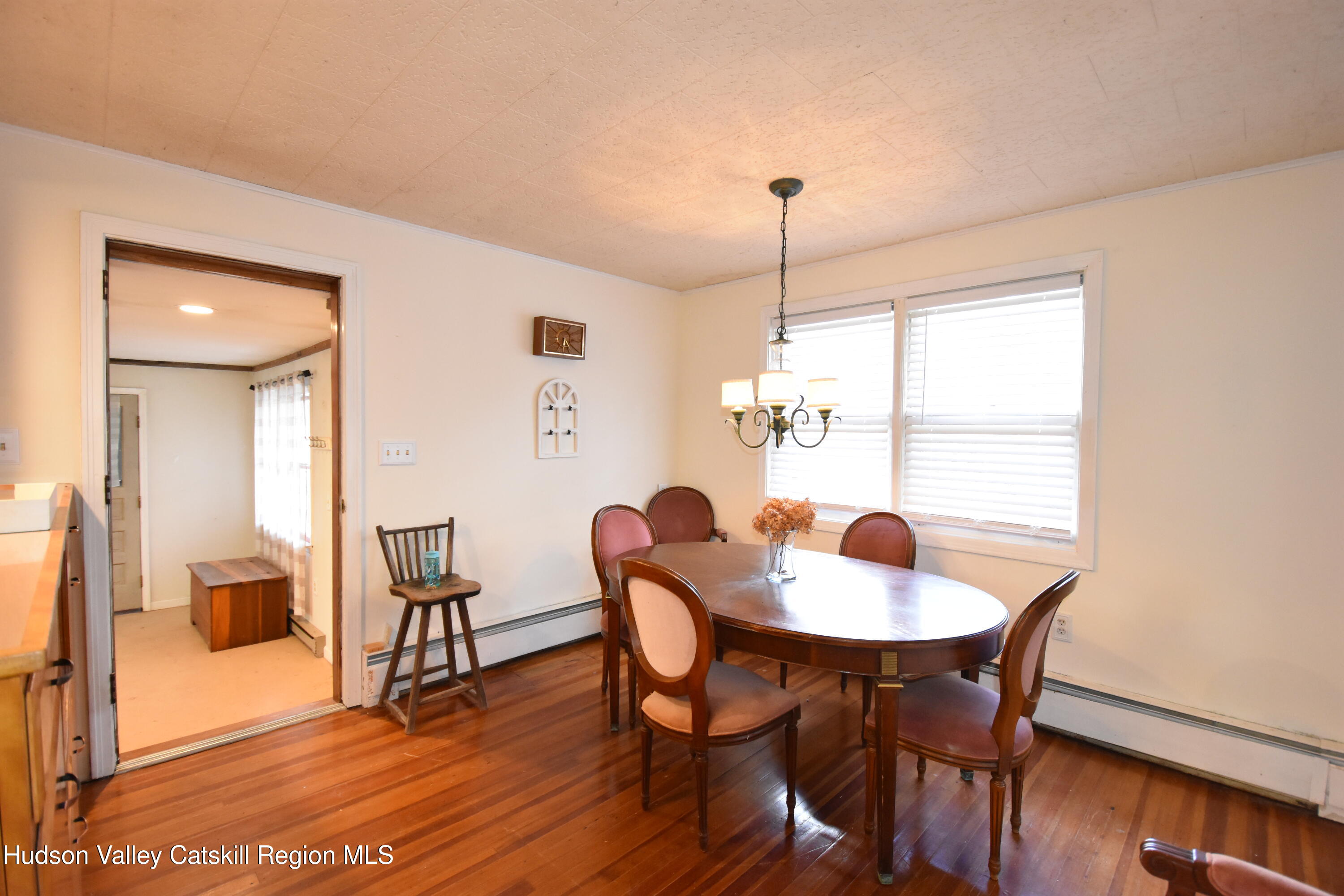 531 Old Post Road New Paltz, NY 12561 - Photo 7 of 25 a view of a dining room with furniture window and wooden floor