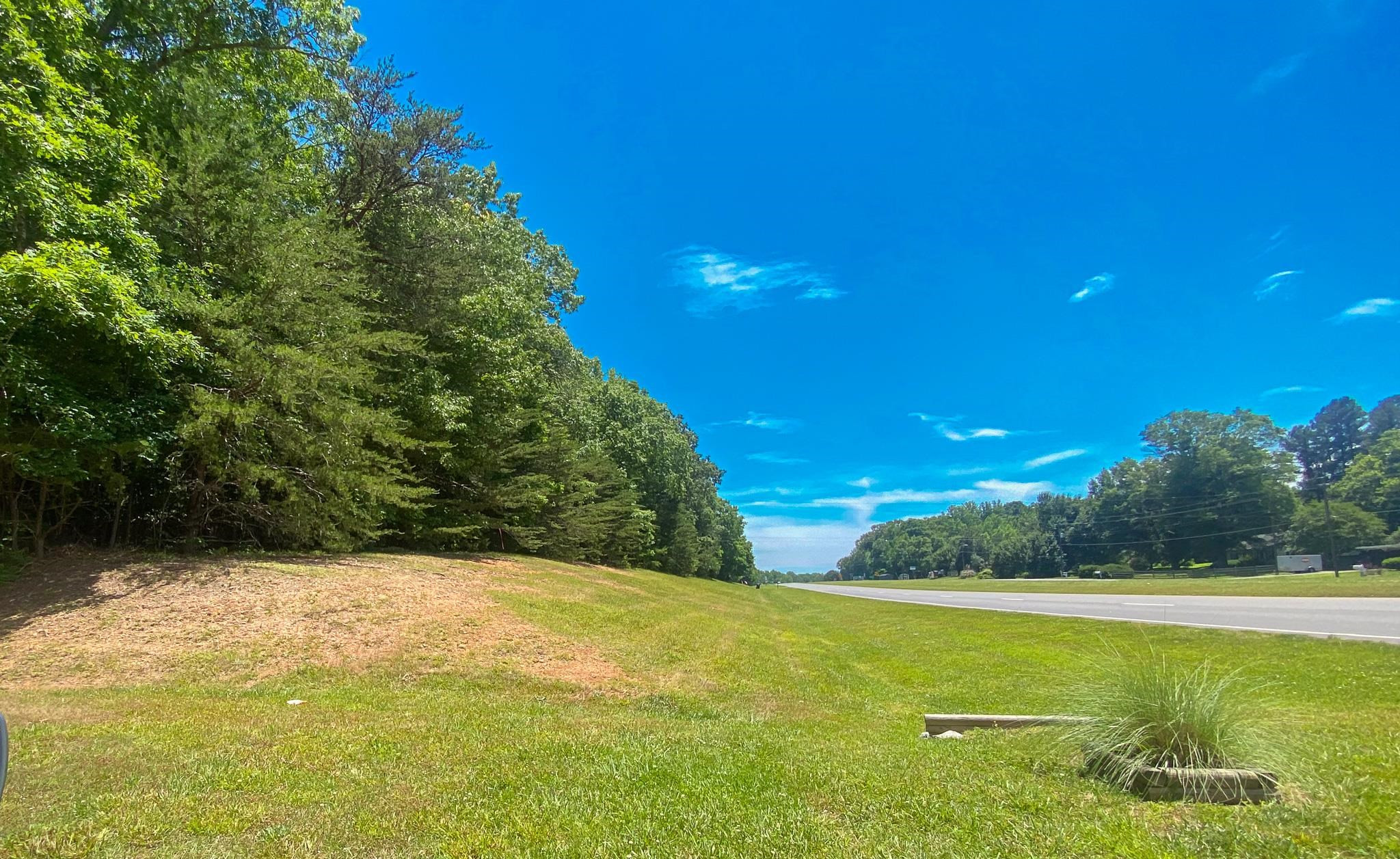 1.50-acre Durham Road Timberlake, NC 27583 - Photo 5 of 16 a view of an outdoor space and a yard