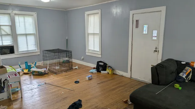 a room with furniture and window