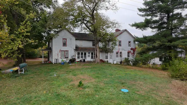 a house view with a garden space