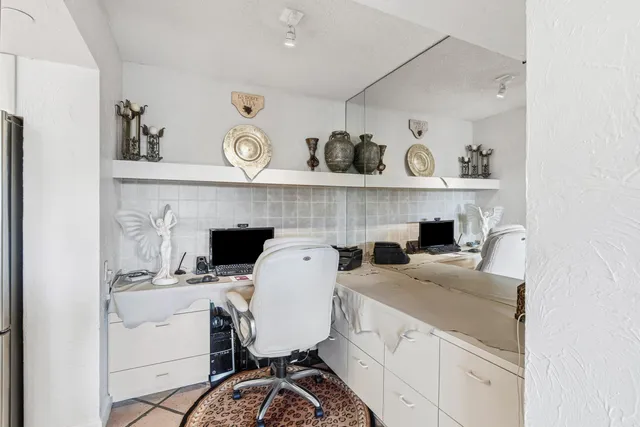 a view of a kitchen with appliances and cabinets