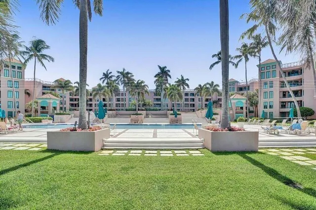 a view of a swimming pool and a fountain