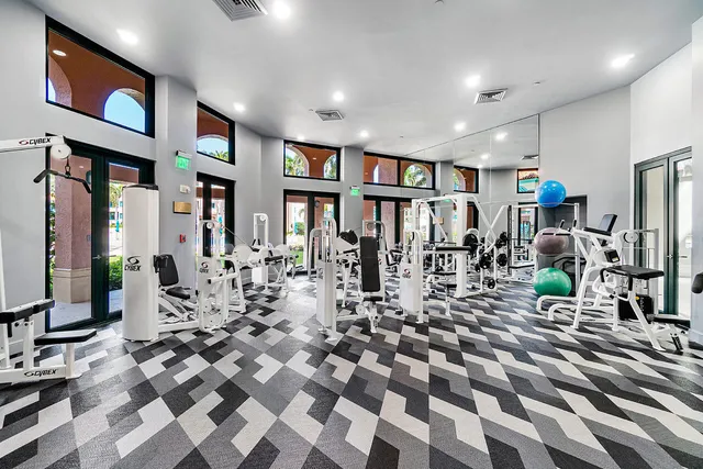 a very nice looking room with lots of gym equipment