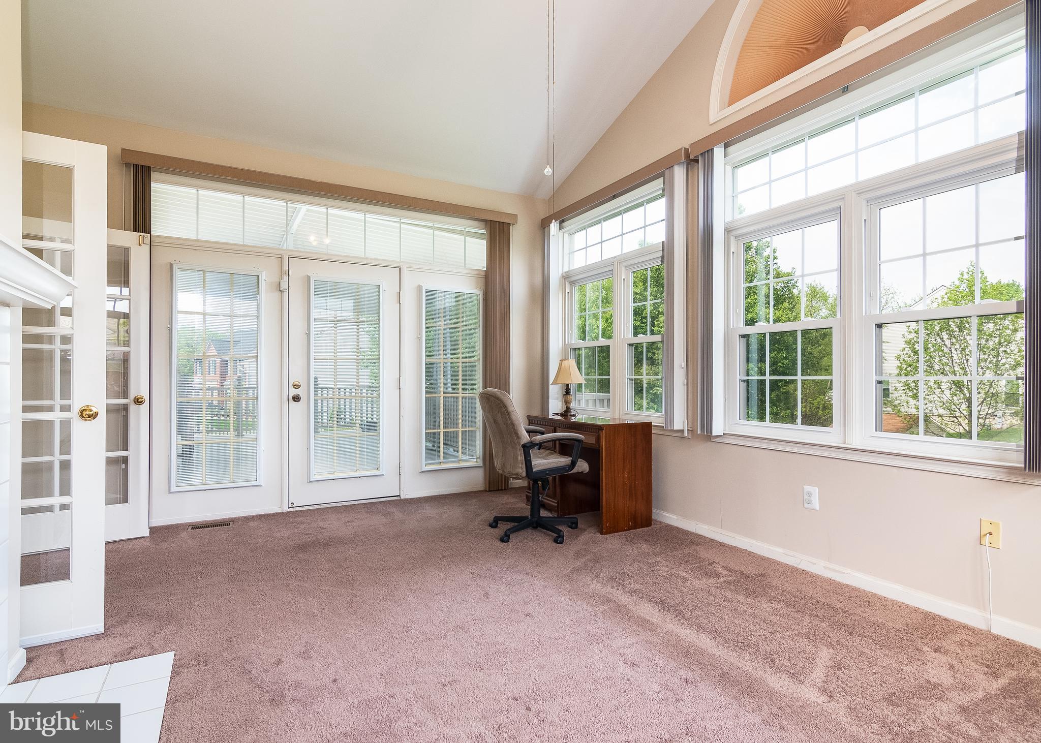5268 Rising Sun Lane Ellicott City, MD 21043 - Photo 3 of 52 Huge sun room with windows all around