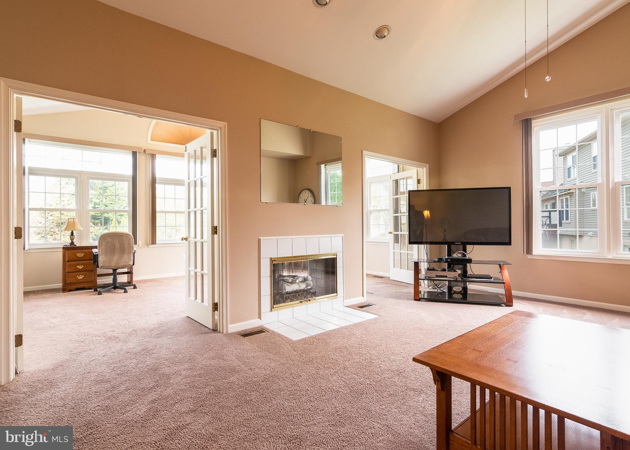 5268 Rising Sun Lane Ellicott City, MD 21043 - Photo 4 of 52 2 sets of French doors open from fam rm to sun rm