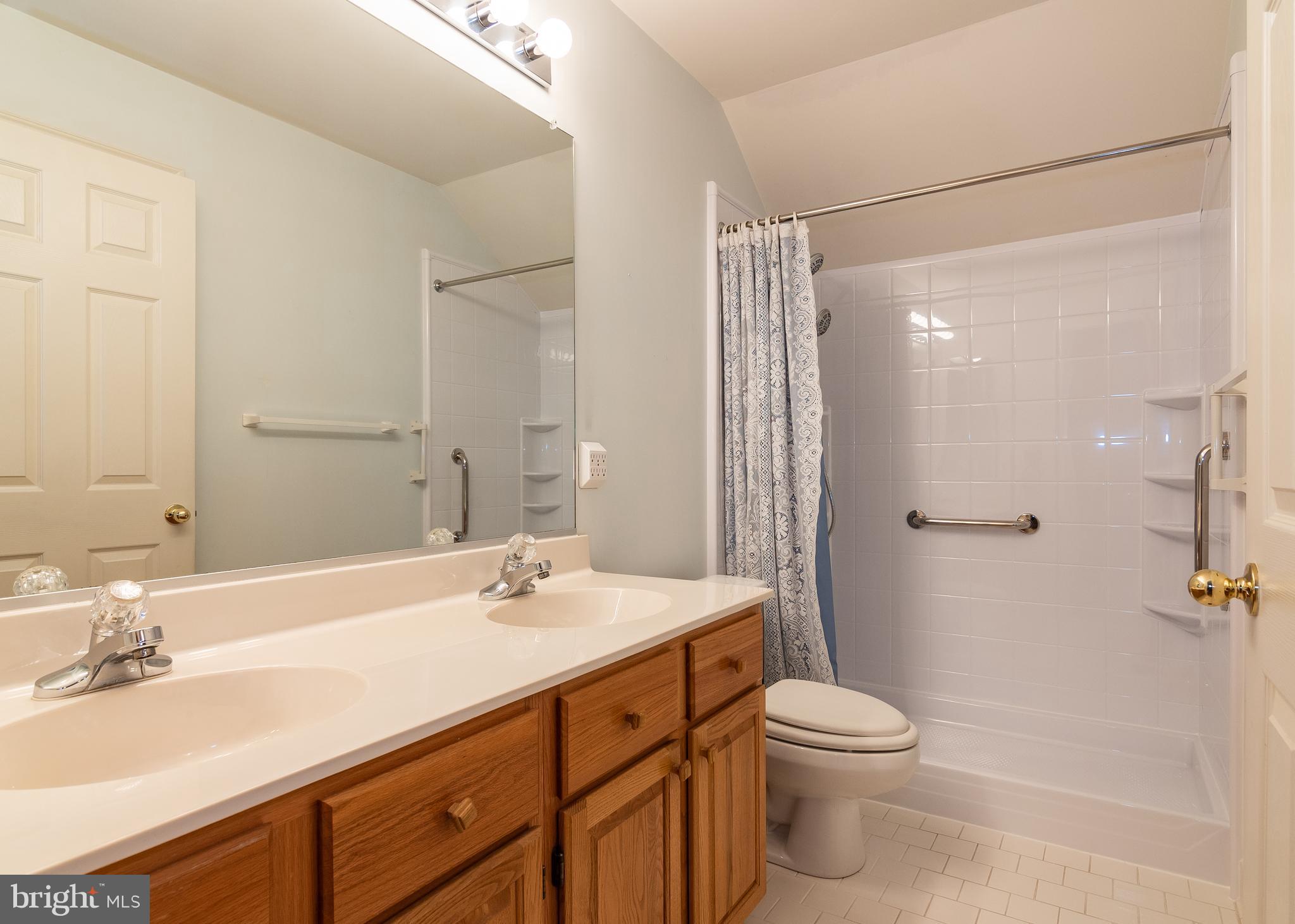 5268 Rising Sun Lane Ellicott City, MD 21043 - Photo 31 of 52 Hall bathroom with double sinks