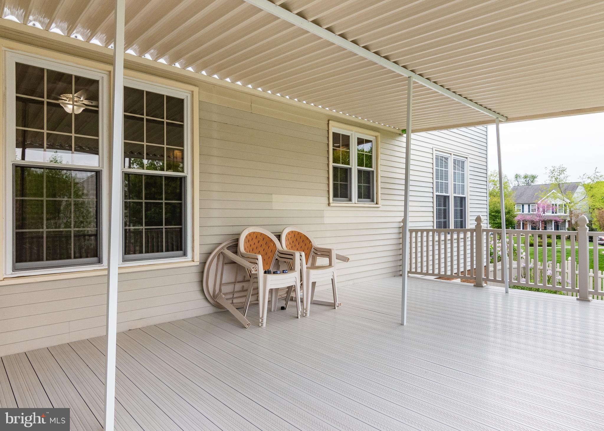 5268 Rising Sun Lane Ellicott City, MD 21043 - Photo 35 of 52 Covered deck off sun room