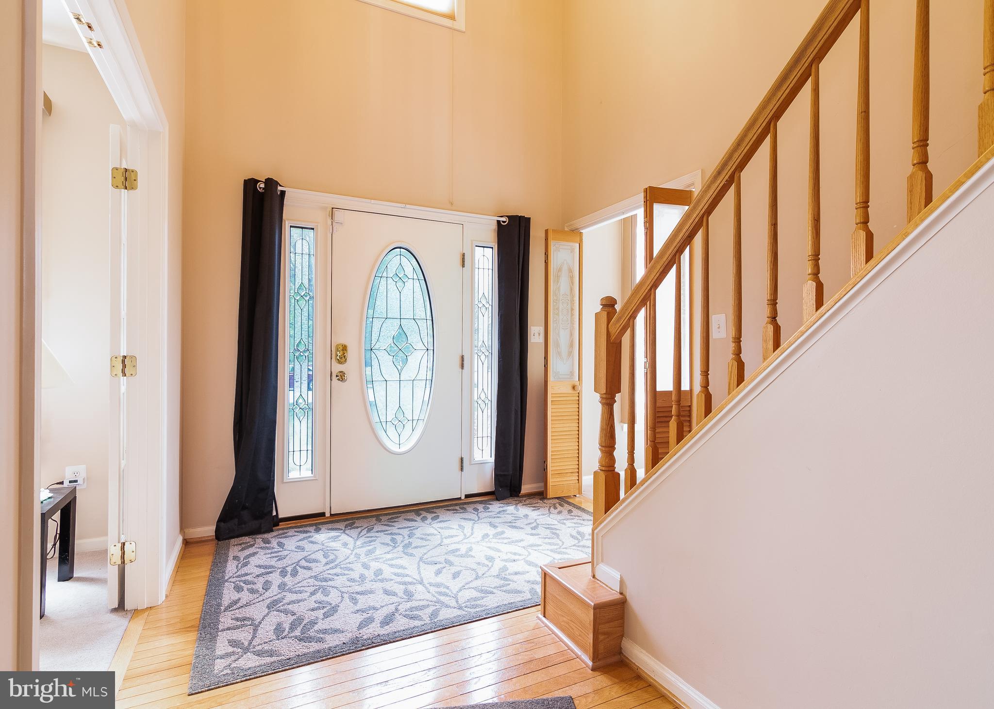 5268 Rising Sun Lane Ellicott City, MD 21043 - Photo 5 of 52 Inviting foyer with custom front door