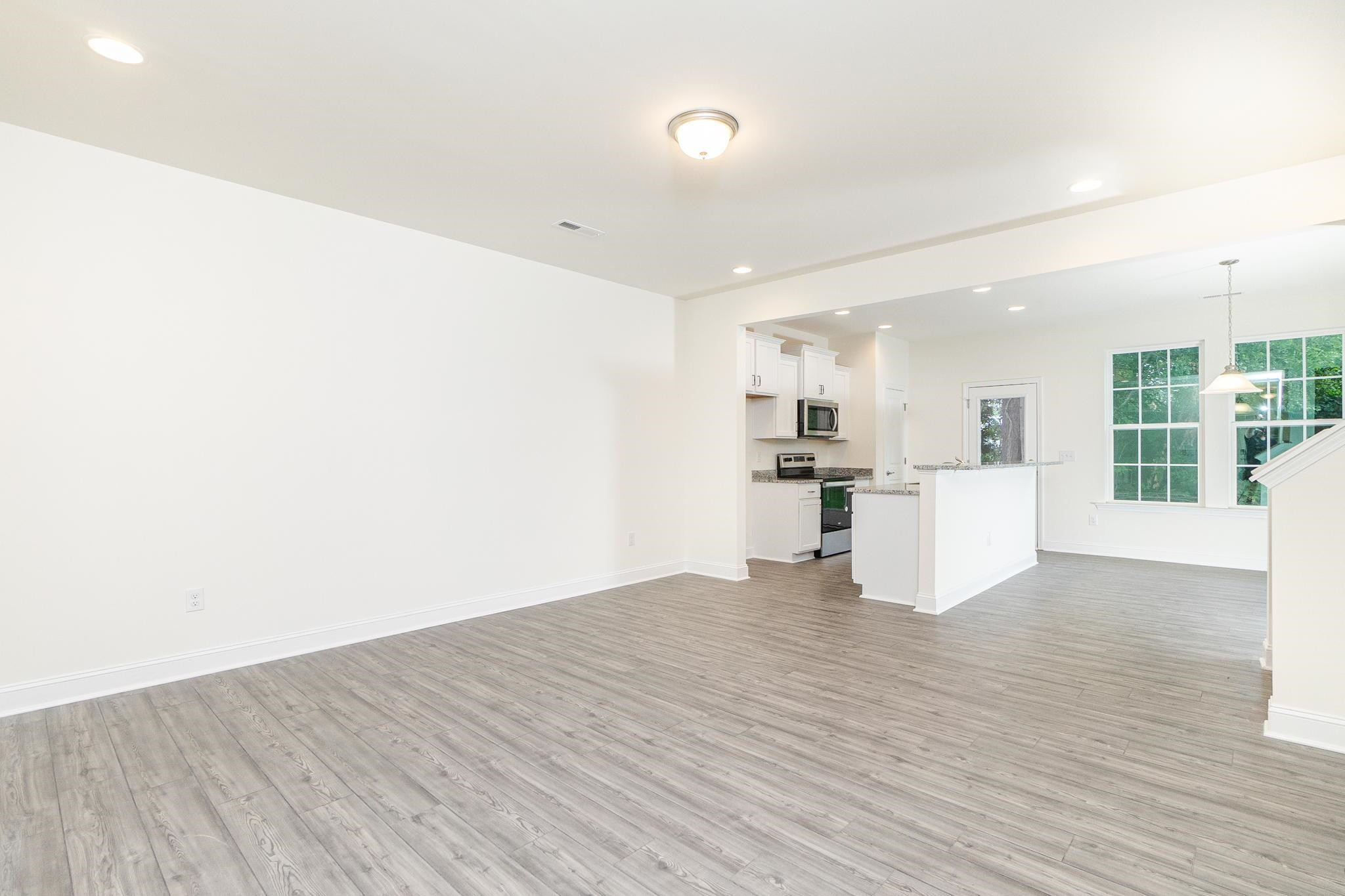 4743 Lord Fogelman Way Raleigh, NC 27610 - Photo 4 of 29 View From Familyroom into Kitchen