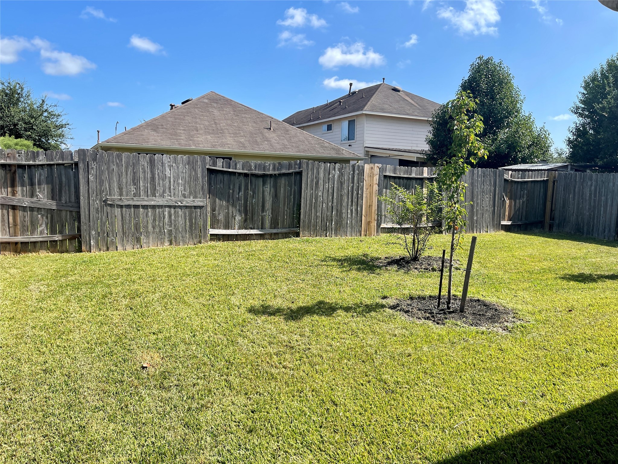 9011 Serena Lane Humble, TX 77338 - Photo 17 of 18 a house with swimming pool in front of it