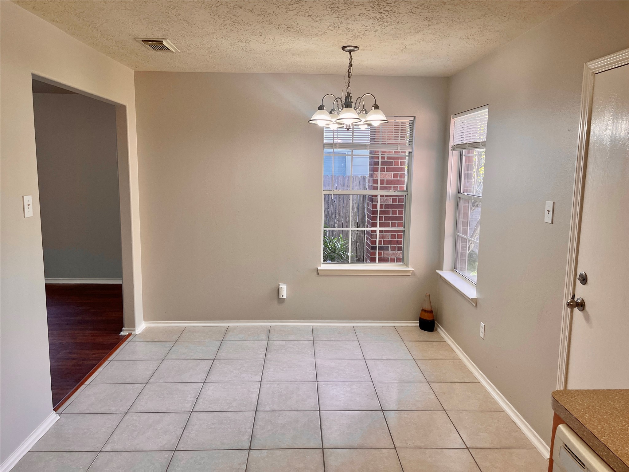 9011 Serena Lane Humble, TX 77338 - Photo 6 of 18 a view of an empty room with a window