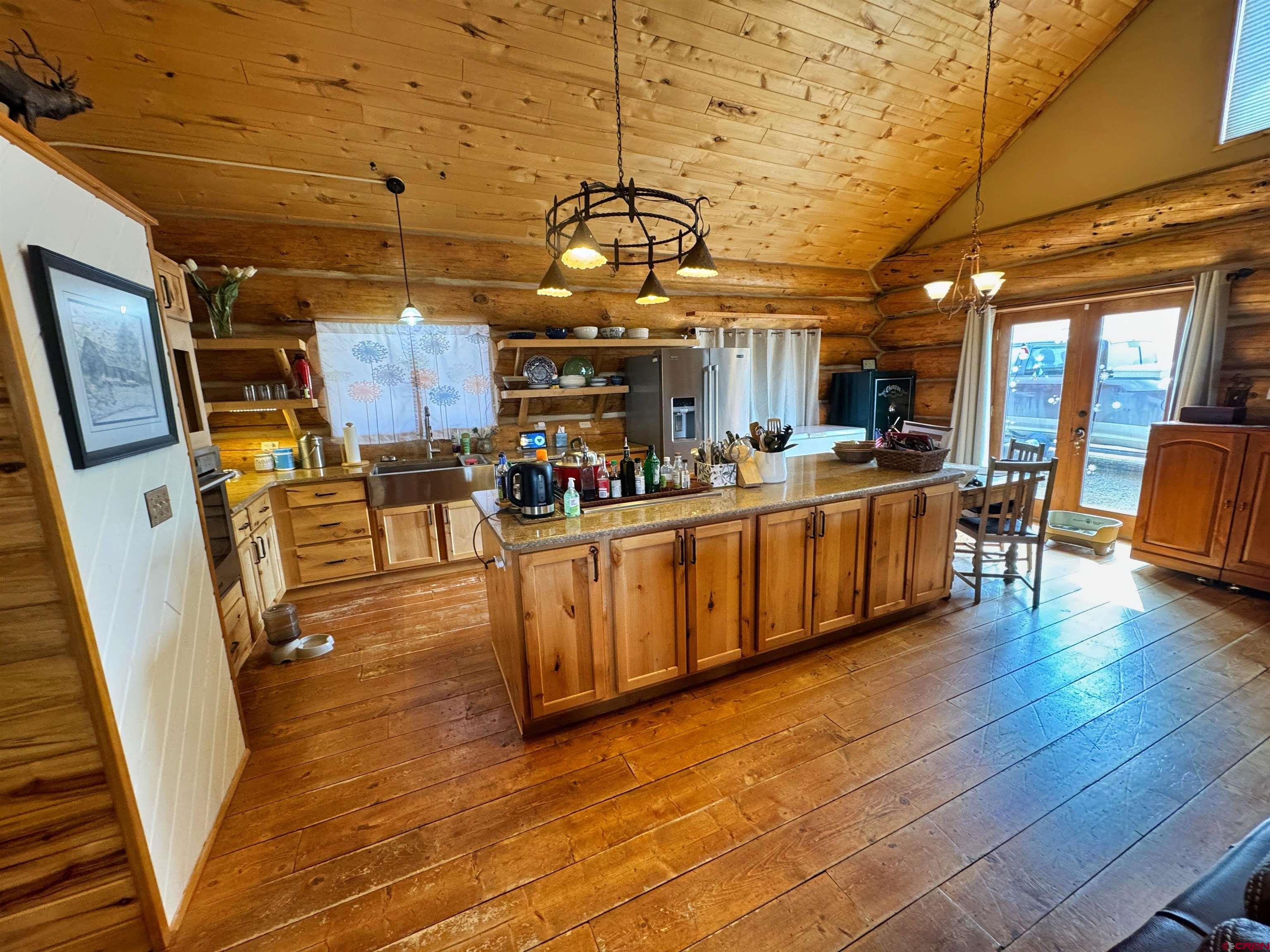 366 Frisco Pass Del Norte, CO 81132 - Photo 11 of 34 a view of a room with wooden furniture