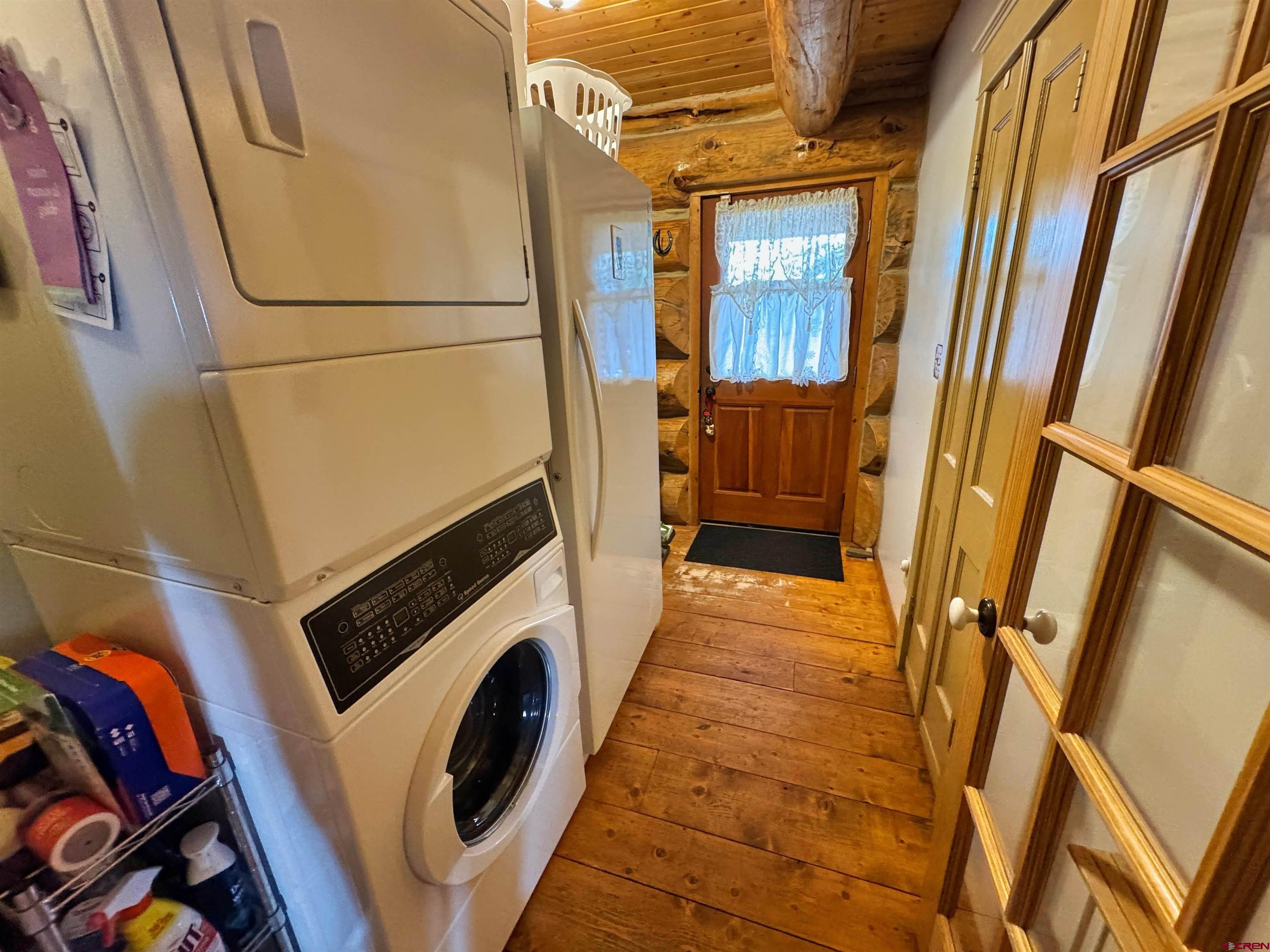 366 Frisco Pass Del Norte, CO 81132 - Photo 23 of 34 a utility room with dryer and washer