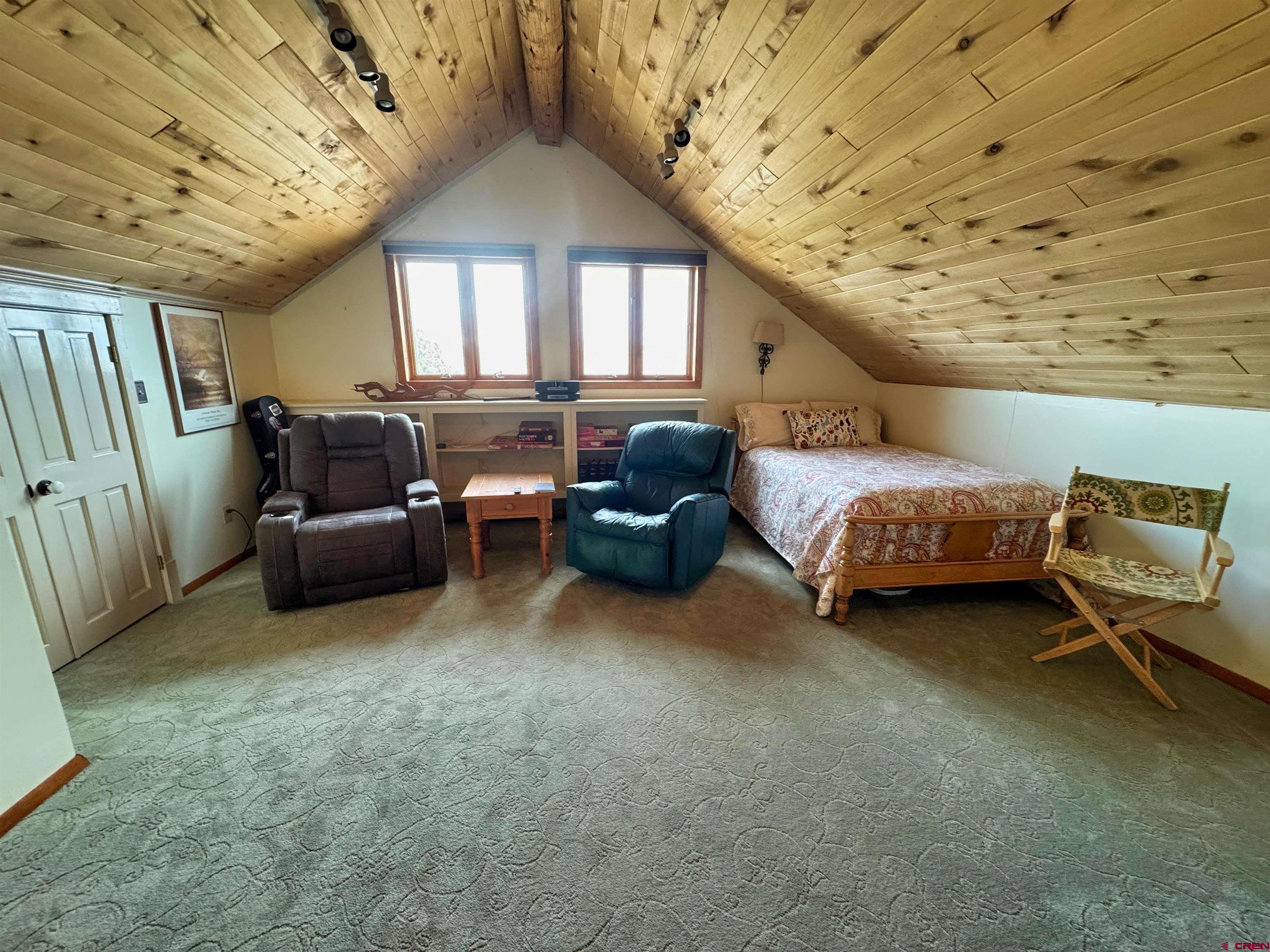 366 Frisco Pass Del Norte, CO 81132 - Photo 29 of 34 a living room with furniture and a ceiling fan