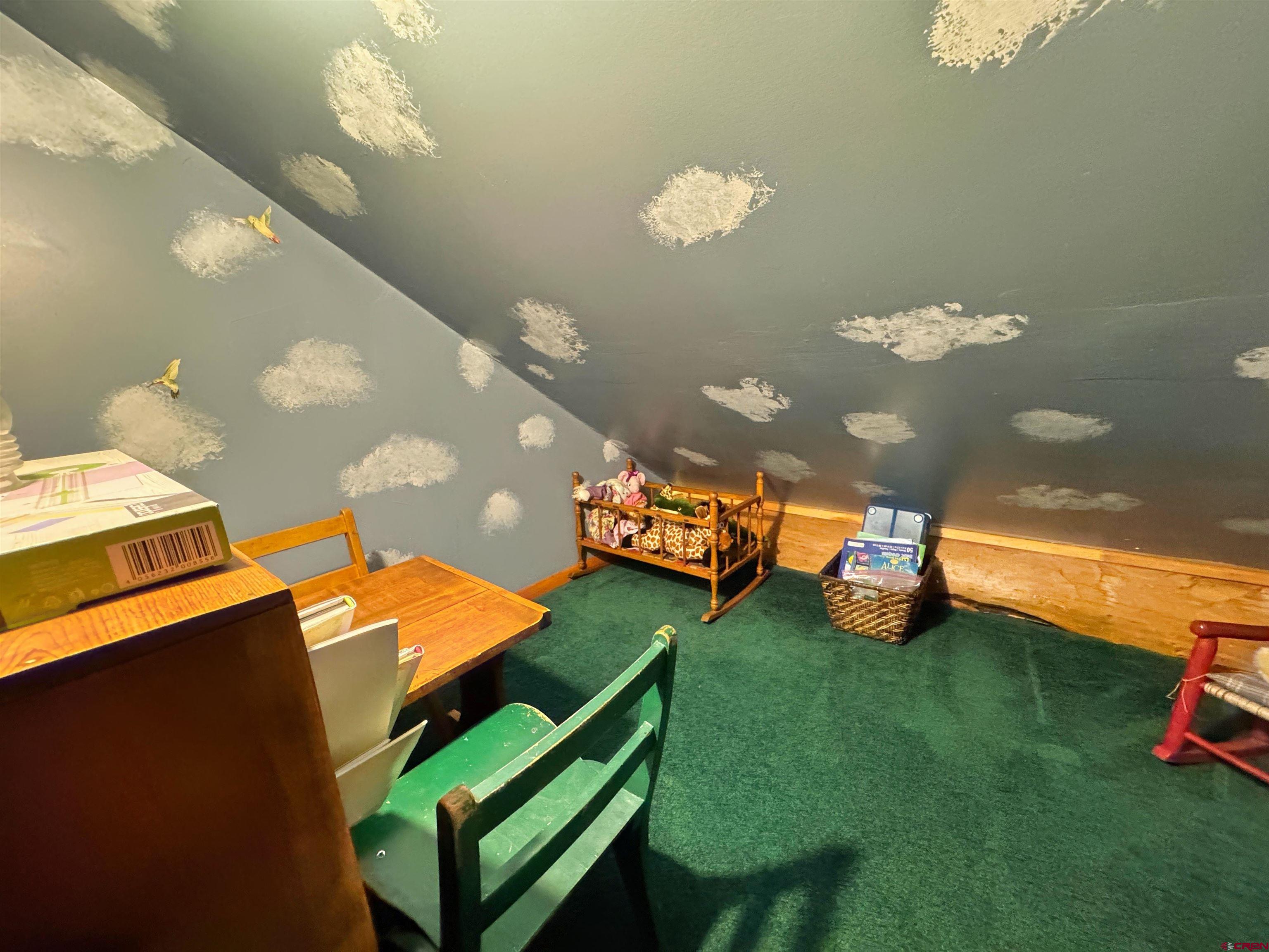 366 Frisco Pass Del Norte, CO 81132 - Photo 31 of 34 a view of a room with toys and wooden floor