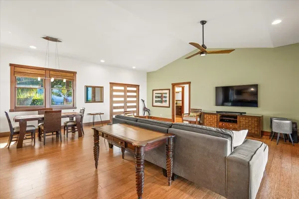 a view of a dining room with furniture window and wooden floor