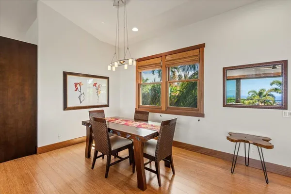 a kitchen with stainless steel appliances granite countertop a stove oven and a refrigerator
