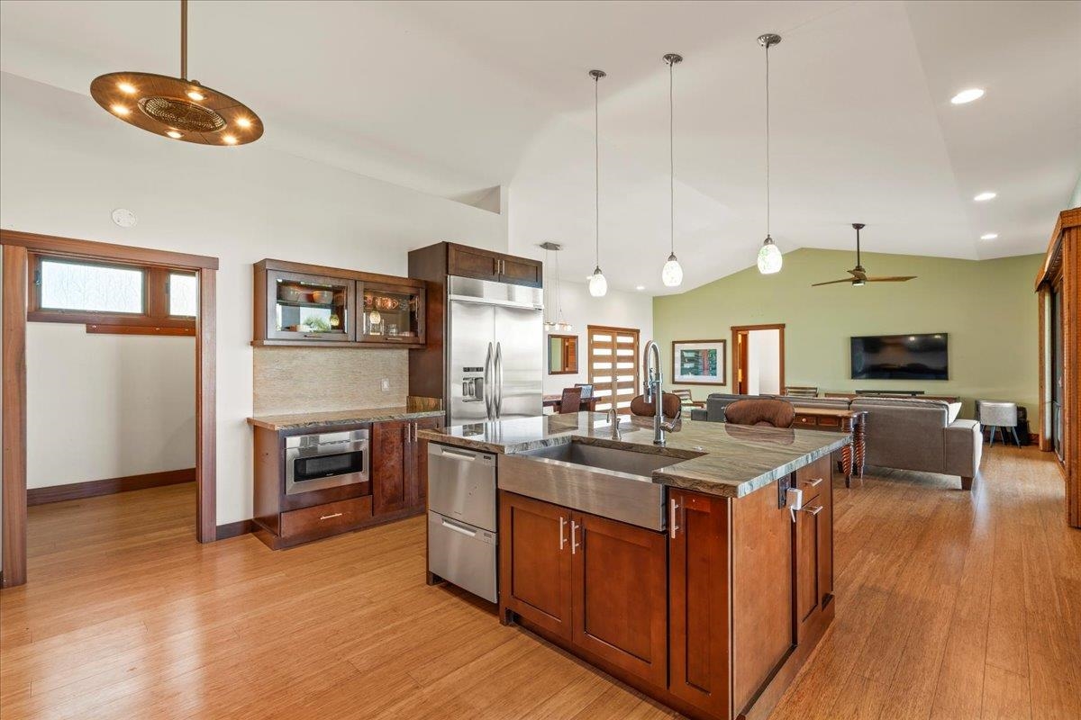10 Leleaka Place Haiku, HI 96708 - Photo 19 of 49 a kitchen with stainless steel appliances granite countertop a stove oven and a refrigerator