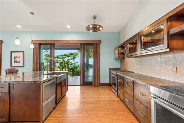 a kitchen with a stove and a microwave