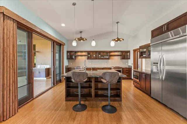 a backyard of a house with lots of green space