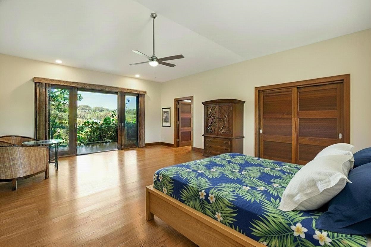 10 Leleaka Place Haiku, HI 96708 - Photo 34 of 49 a bedroom with a large bed and a window