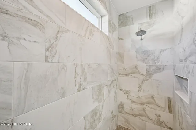 a bed room with a bed and a couch