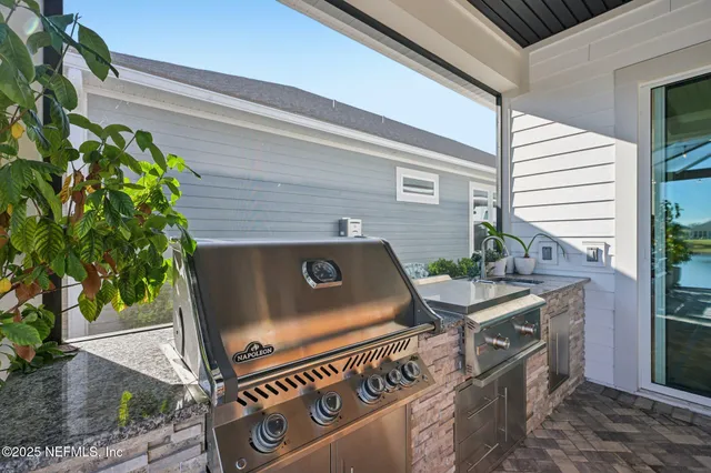 a view of a lake with a house in the background