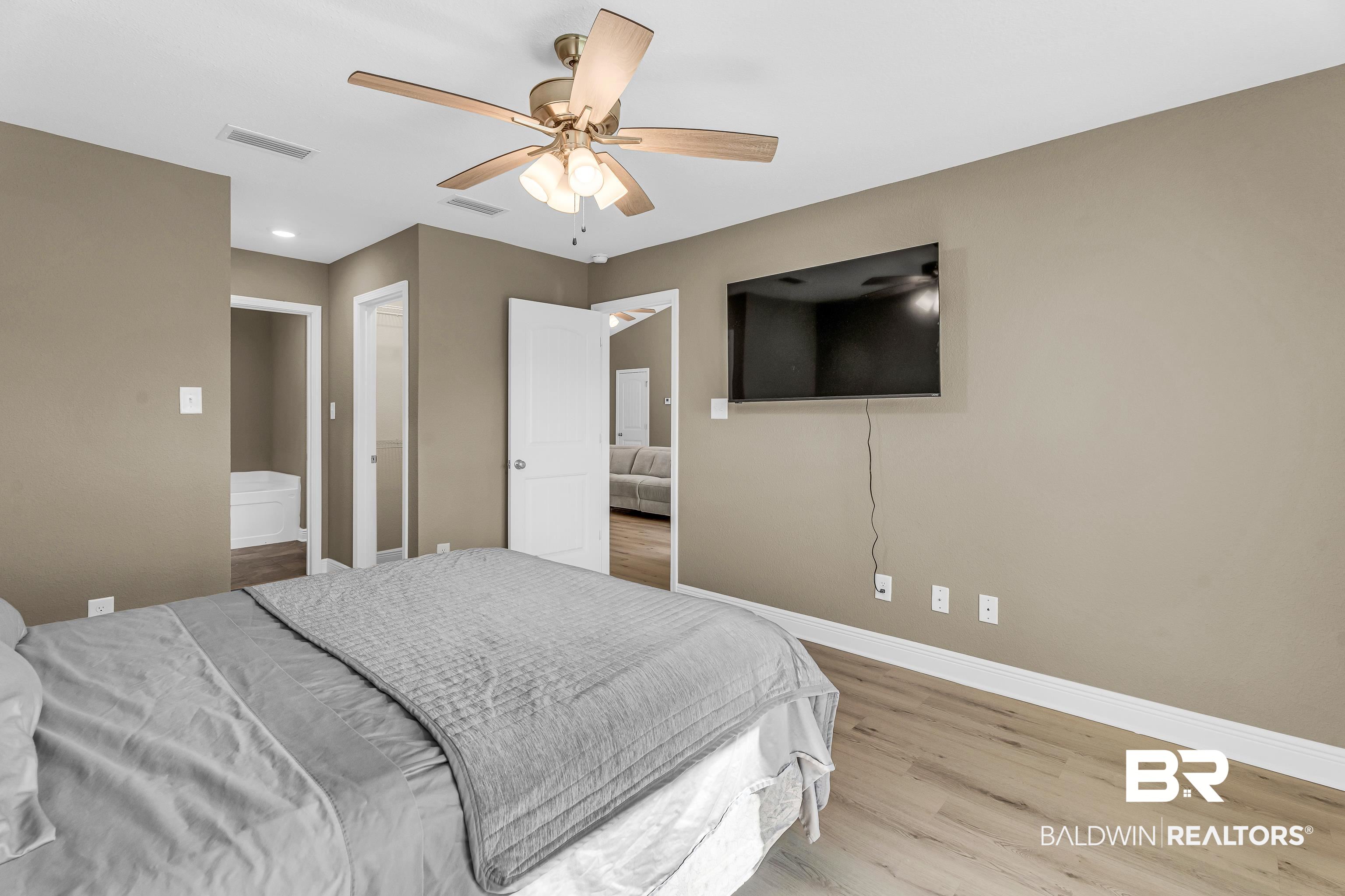 9206 Greenleaf Drive Daphne, AL 36527 - Photo 14 of 32 Bedroom with wood finished floors and ceiling fan