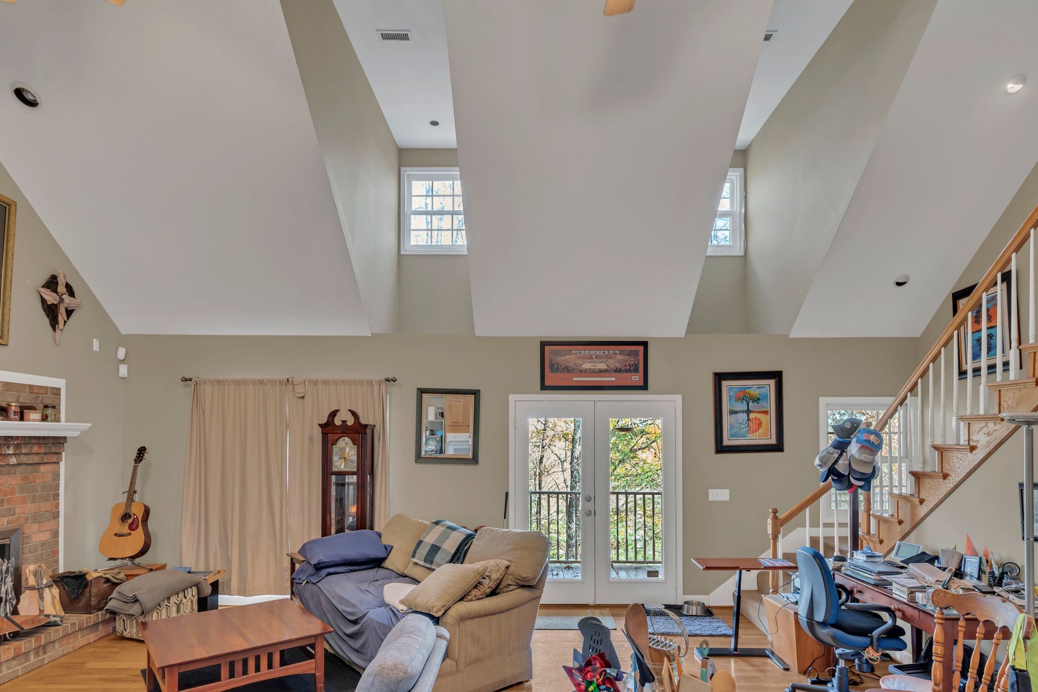 8242 River Rd Pike Nashville, TN 37209 - Photo 13 of 35 a living room with furniture and a flat screen tv