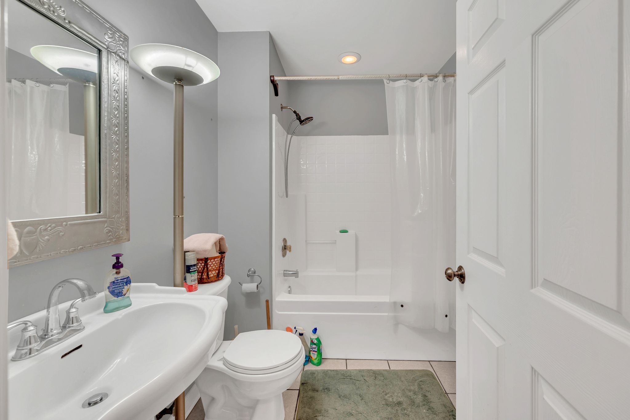 8242 River Rd Pike Nashville, TN 37209 - Photo 23 of 35 a bathroom with a sink toilet and shower