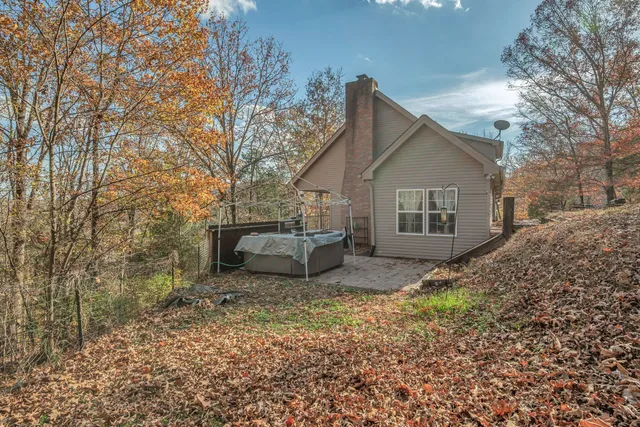 a house view with a backyard space