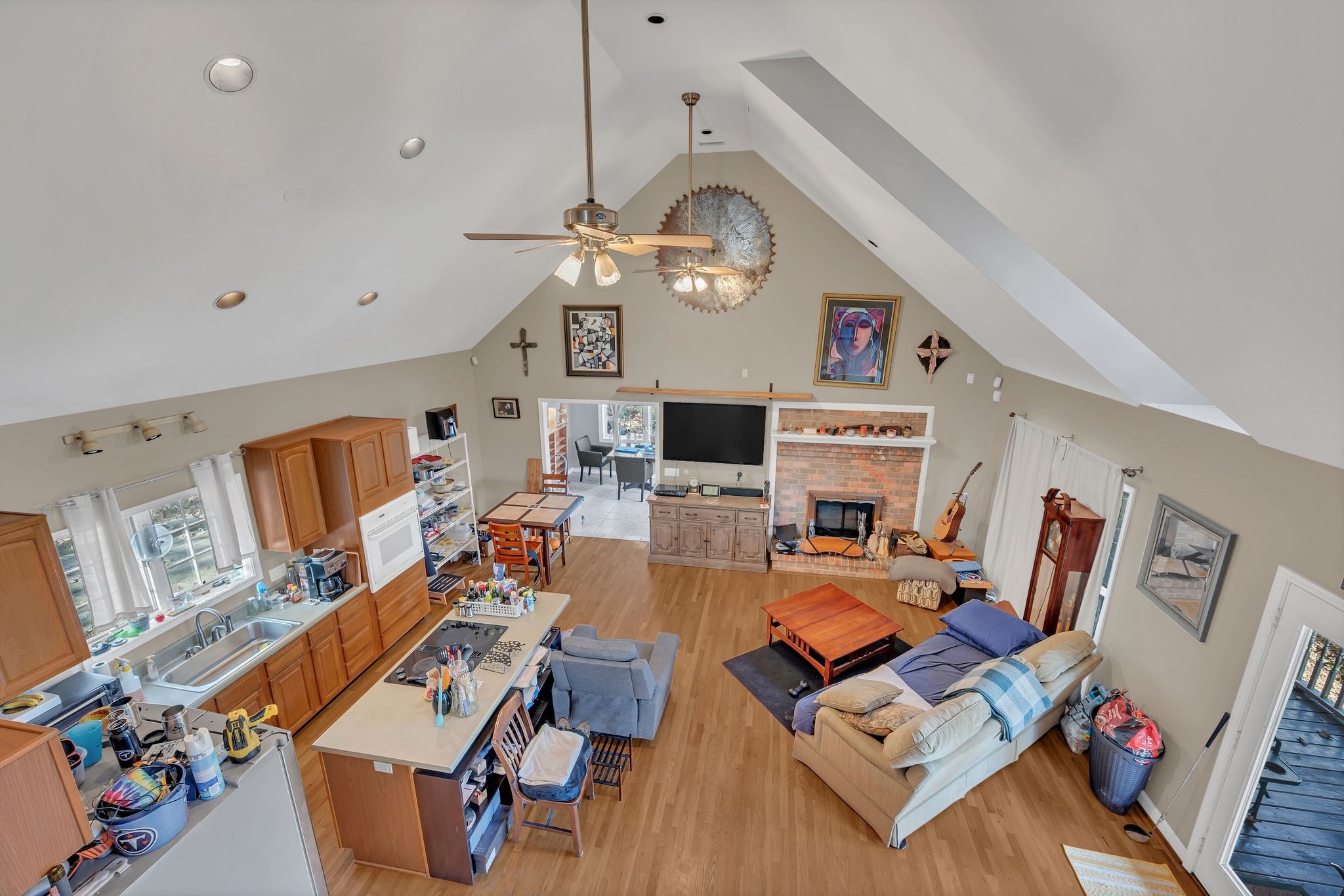 8242 River Rd Pike Nashville, TN 37209 - Photo 9 of 35 a living room with fireplace furniture and a flat screen tv