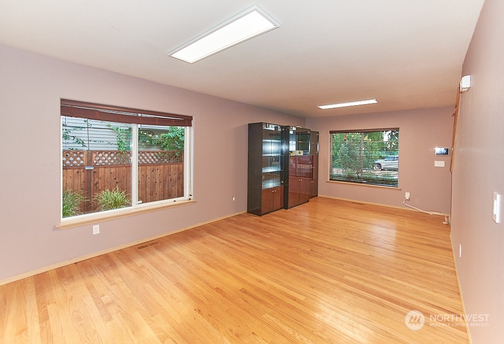 133 120th Street Southeast, Unit B Everett, WA 98208 - Photo 2 of 14 a view of an empty room with a window and a kitchen