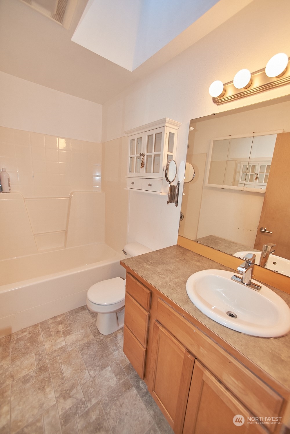 133 120th Street Southeast, Unit B Everett, WA 98208 - Photo 6 of 14 a bathroom with a sink a toilet and a bathtub