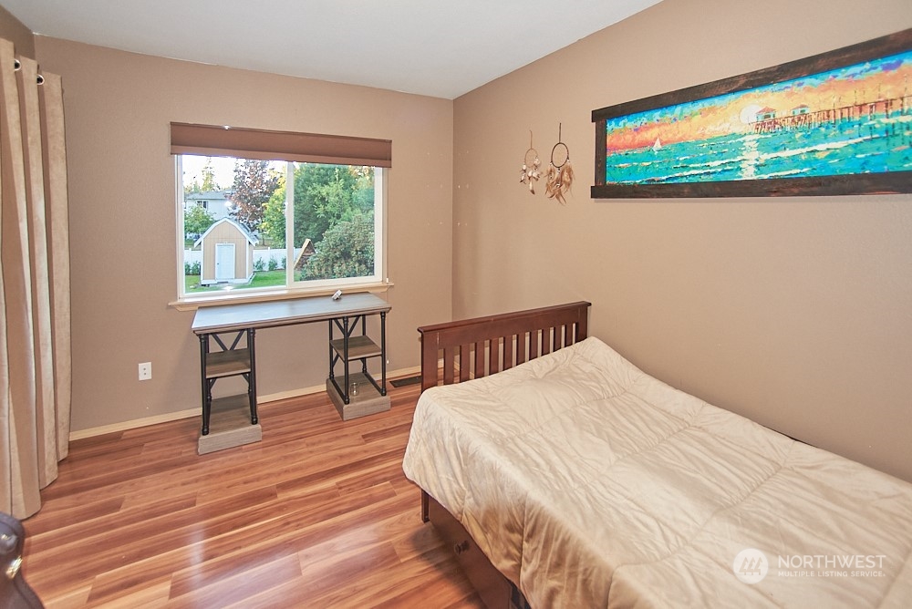 133 120th Street Southeast, Unit B Everett, WA 98208 - Photo 10 of 14 a bedroom with a bed and a window