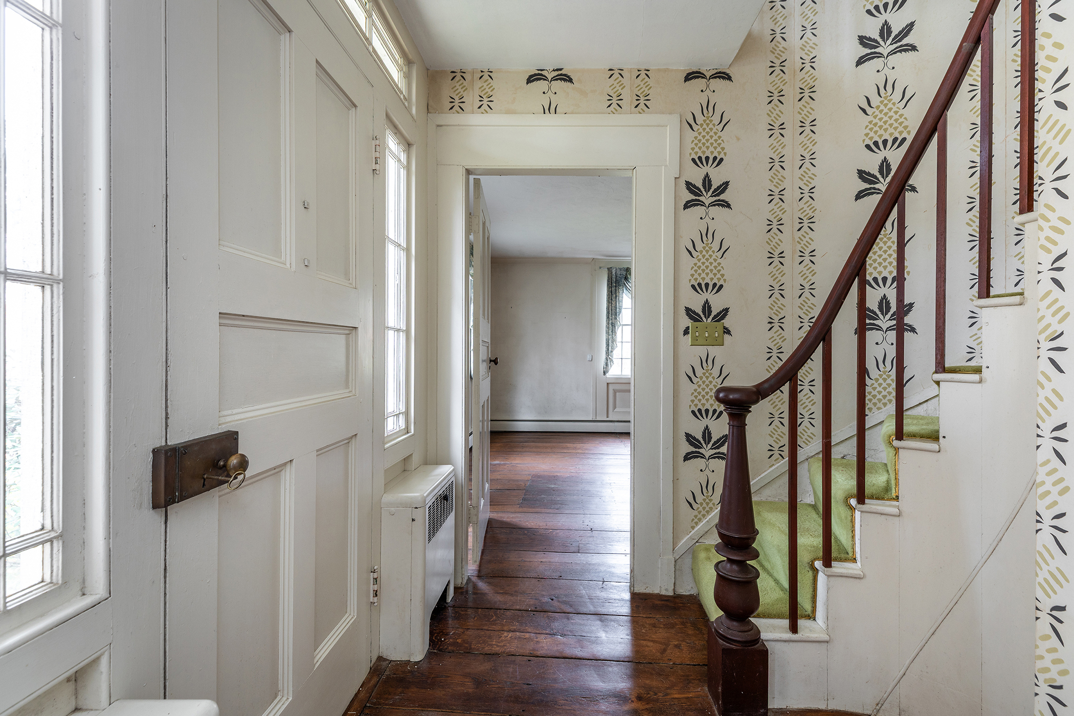 28 Sunny Ridge Road Washington, CT 06793 - Photo 27 of 35 a view of an entryway with wooden floor and stairs