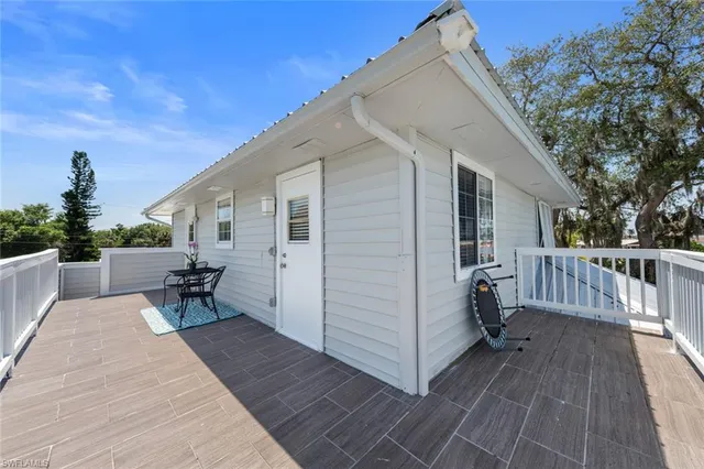 a view of balcony and chairs