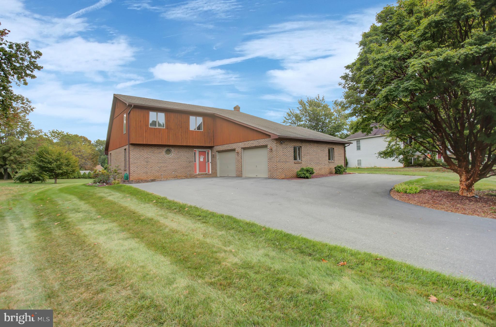 10050 McCreary Road Shippensburg, PA 17257 - Photo 1 of 64 a front view of house with yard and trees
