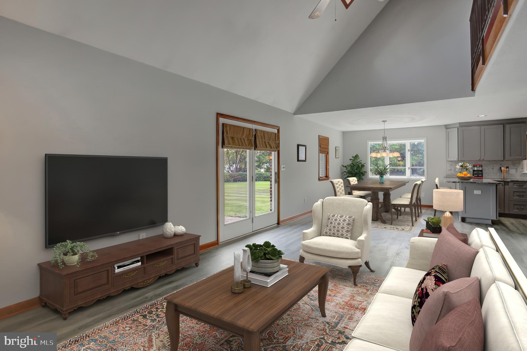 10050 McCreary Road Shippensburg, PA 17257 - Photo 11 of 64 a living room with furniture and a flat screen tv