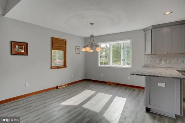 a view of a kitchen with a sink and dishwasher a kitchen view