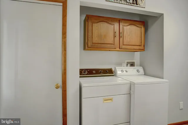 a bathroom with a sink vanity and a mirror