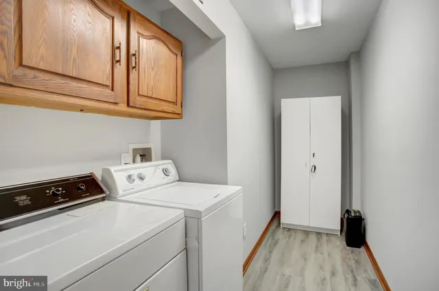 a view of staircase with rug